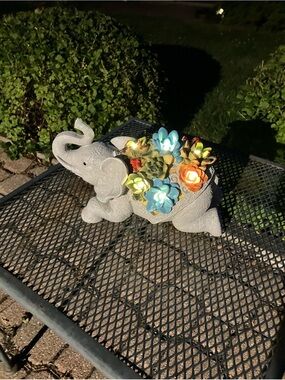 Mrcrafts white Elephant Sculpture with Blue, Orange and Yellow Floral Accents